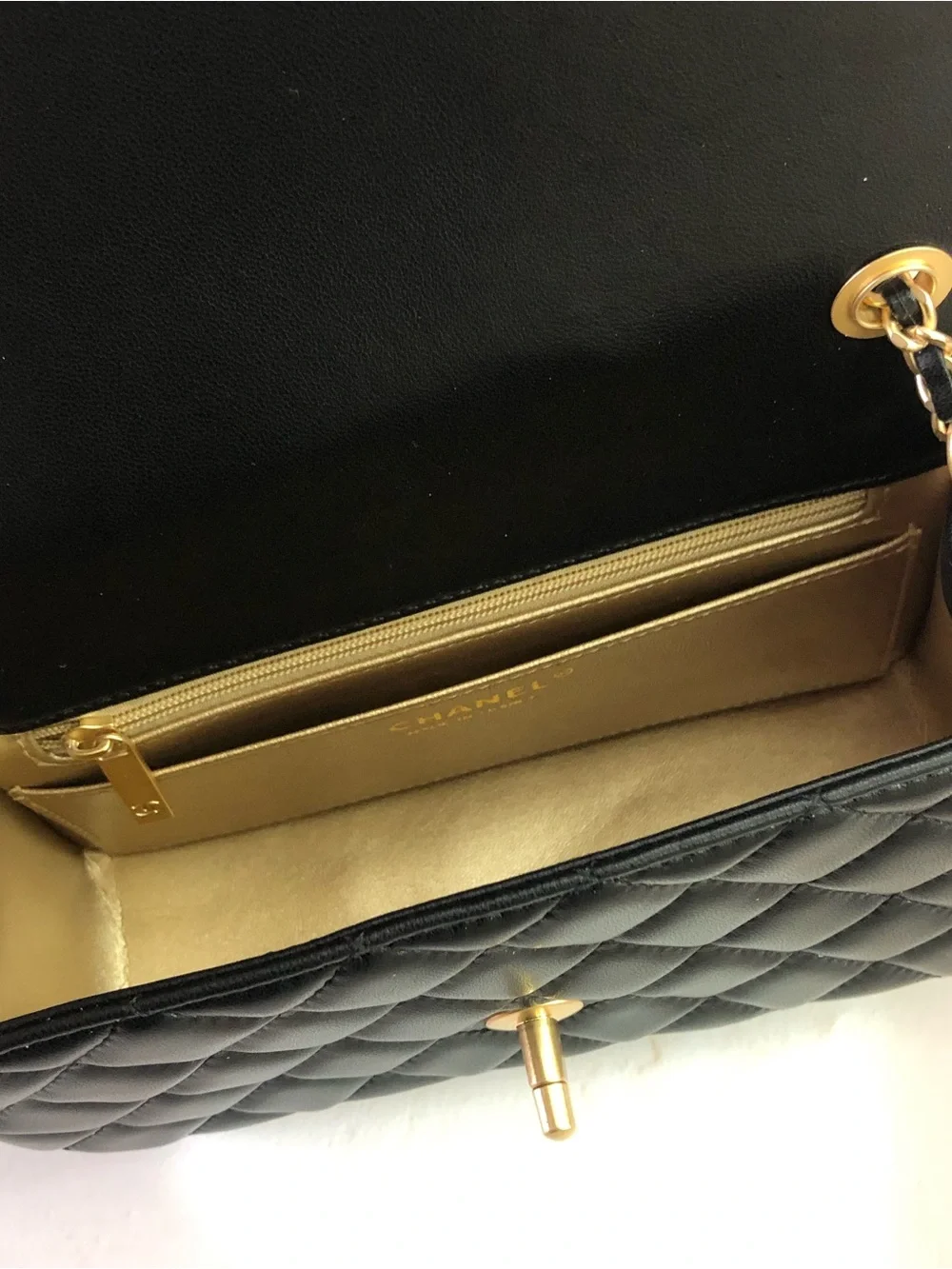 CHANEL Black Quilted Lambskin Mini Flap Bag with Gold Chain